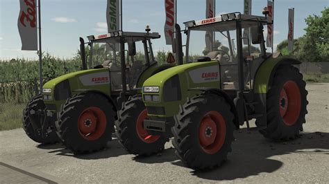 Claas Ares 640RZ na tle zabudowań gospodarczych