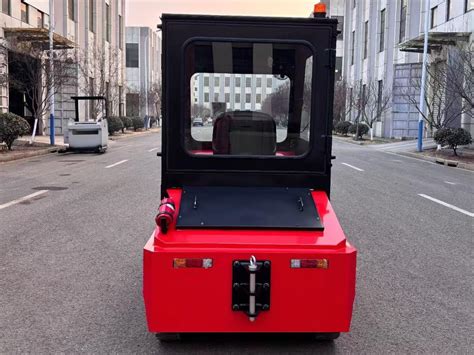 Thematic photo of an electric tow tractor in a warehouse environment