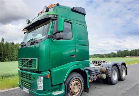 Thematic photo of a Volvo FH12 truck on a road