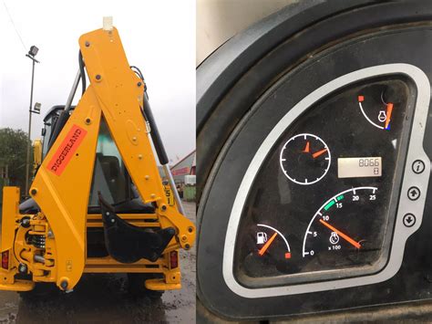 Panel wskaźników JCB z wyróżnionym licznikiem motogodzin