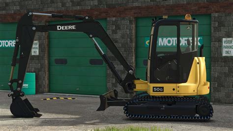 Koparka gąsienicowa John Deere w pracy