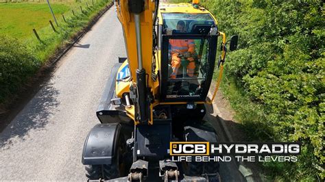 Schemat działania układu SRS (Smooth Ride System) w JCB 3CX
