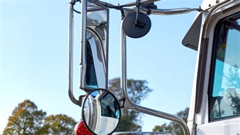 Thematic photo of a tractor cabin with properly installed mirrors