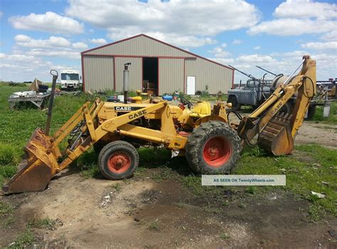Photo of an older Case 580 backhoe loader