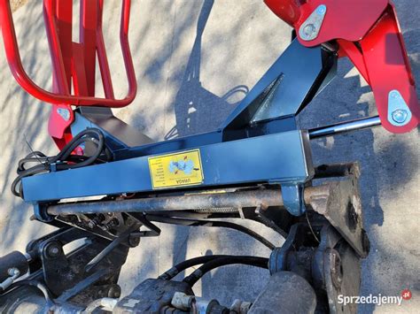 Szczegóły konstrukcyjne ramion chwytaka do bel z widocznym mechanizmem