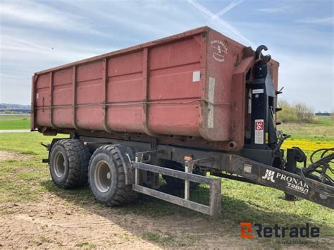 Photo of a PRONAR hooklift trailer with a PRONAR container.