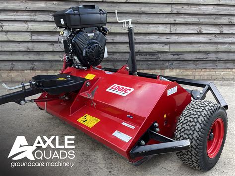 Thematic photo of a quad with an attached mower working in the field