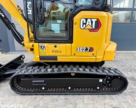 Minikoparka Caterpillar w akcji