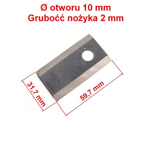 zbliżenie na noże tnące kosiarki bębnowej