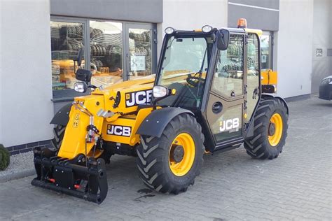 Ładowarka teleskopowa JCB 550-80 z chwytakiem do śmieci
