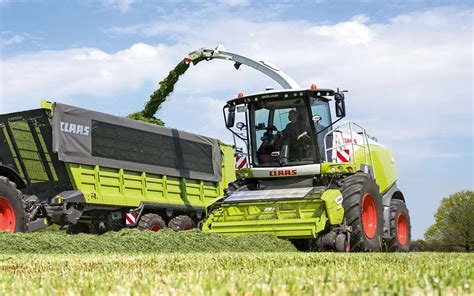 CLAAS service technician working on a machine