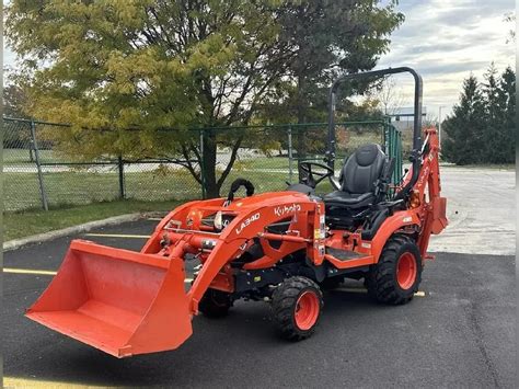 Thematic photo of a Kubota mini tractor with a 4x4 drive, showing its compact size and sturdy construction.