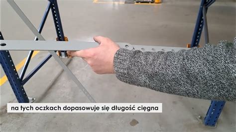 Schemat montażu ramy pługa do przedniego zderzaka ciągnika z zaznaczeniem punktów mocowania śrubowego