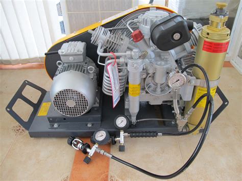 Thematic photo of diving cylinders and a compressor