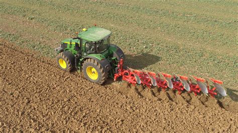 Thematic photo of a 5-furrow reversible plough working in a field