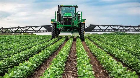 Thematic photo of a tractor sprayer working in a field