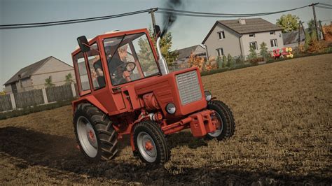 zdjęcie ciągnika rolniczego Władymirec T25 w akcji na polu