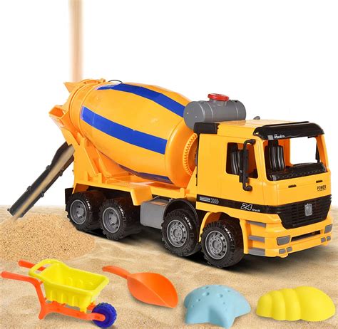 Thematic photo of a green Wader Middle Truck concrete mixer toy in a sandbox