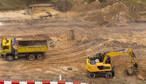 Schematic of earthworks operations using a tipper truck and excavator