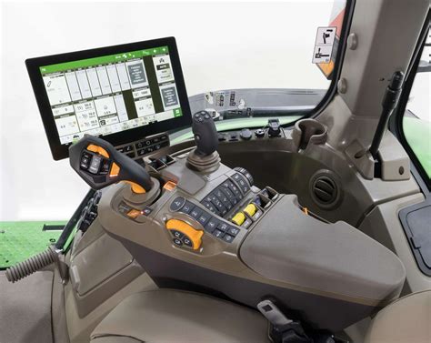 The interior of a modern Deutz-Fahr tractor cab, showing the dashboard and controls