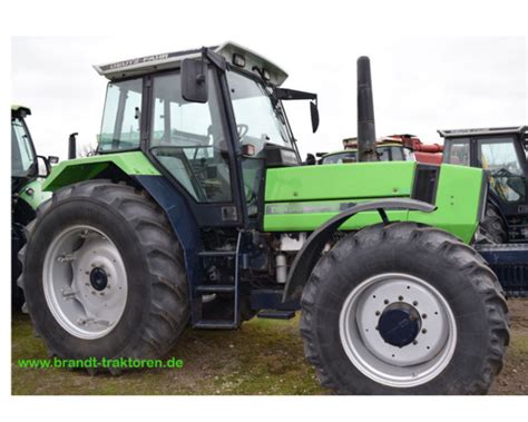 Zdjęcie ciągnika Deutz-Fahr 6.61 z szybą drzwiową z zamkiem montowanym w ramie