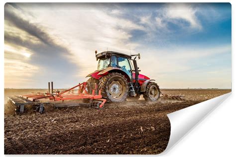 ilustracja przedstawiająca traktor pracujący w trudnych warunkach (kurz, słońce, błoto)