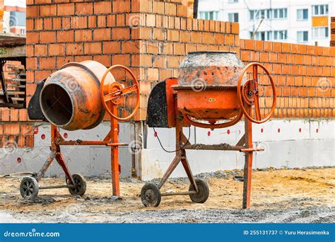 Thematic photo of concrete mixers on a construction site