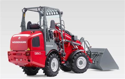 The Weidemann 1350 loader at work in an agricultural setting