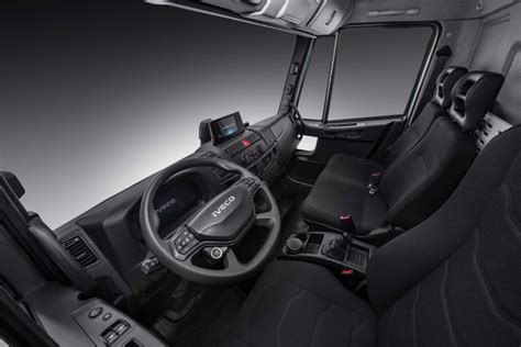 Interior photo of an Iveco Eurocargo cabin, showing the dashboard and driver's seat