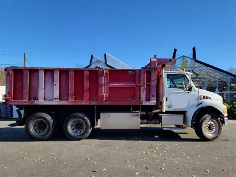 Thematic photo of a delivery dump truck in action