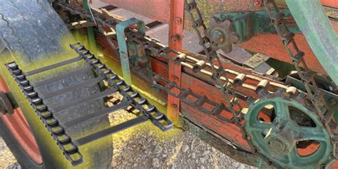 Detailed diagram of a chain conveyor and safety features in a manure spreader