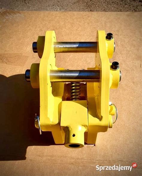 Zdjęcie lub schemat mechanicznego szybkozłącza do minikoparki