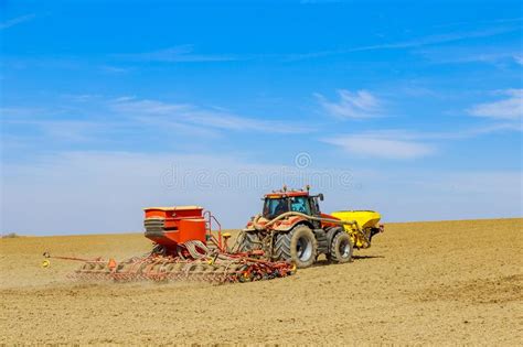 Thematic photo of a modern grain drill working in a field