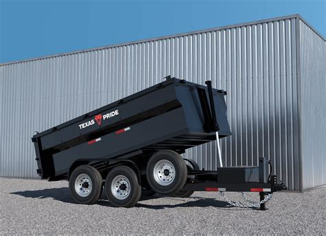 Thematic photo of a tandem dump trailer in a field during harvest