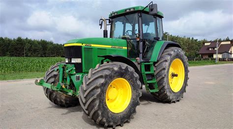 The John Deere 7710 tractor at work, showcasing its powerful build