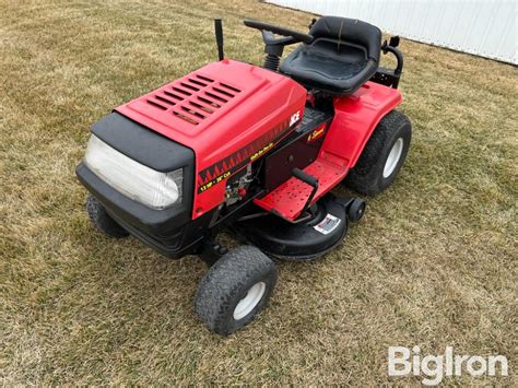Thematic photo of the MTD 76 lawn tractor in a garden setting