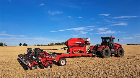 Thematic photo of a modern Unia seeder working in the field