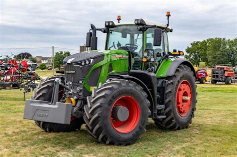 The Fendt 936 Vario Profi tractor operating in a field, possibly with a front-mounted implement