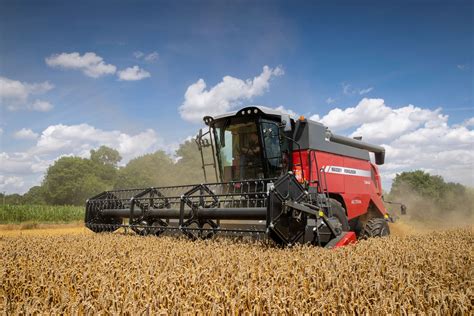 Thematic photo of a Massey Ferguson combine harvester at work in a field