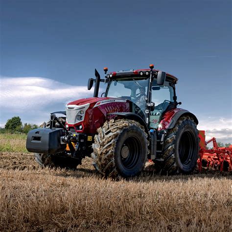Thematic photo of a red McCormick X7 tractor working in a field