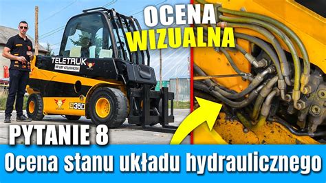 Infografika przedstawiająca przekrój silnika i układu hydraulicznego ładowarki JCB