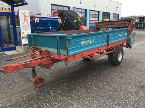 Thematic photo of a used Mengele manure spreader in a field