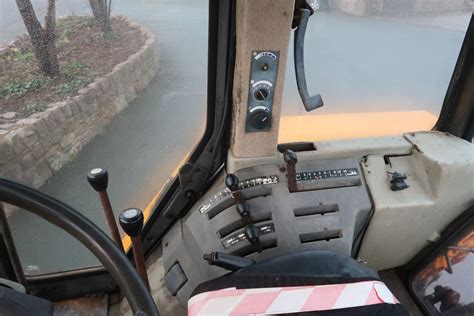 Historical photo of the interior of a Renault 103-12 TX cabin, showcasing its features.