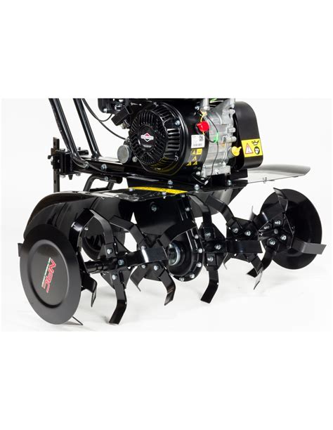 Detailed photo of the NAC TIP80-196-M tiller's working part and transport wheels
