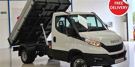 Thematic photo of an Iveco Daily tipper truck in an urban or construction environment