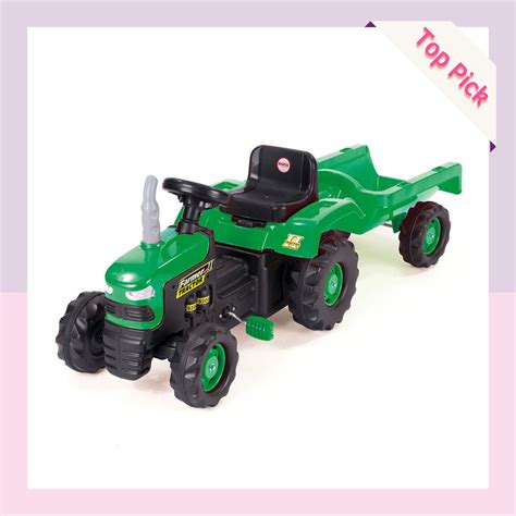 Photo of the Baby Mix tractor with its detachable trailer and included tools.