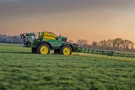 The John Deere 500R self-propelled sprayer working in a field