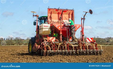 Thematic photo of a modern seed drill working in the field