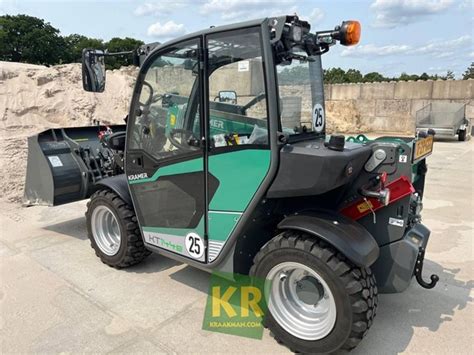 Zdjęcie miniładowarki teleskopowej Kramer KT144 w akcji