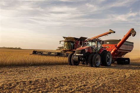 Thematic photo: Modern Case IH tractor at sunset in a field